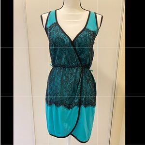 Beautiful turquoise dress with black lace